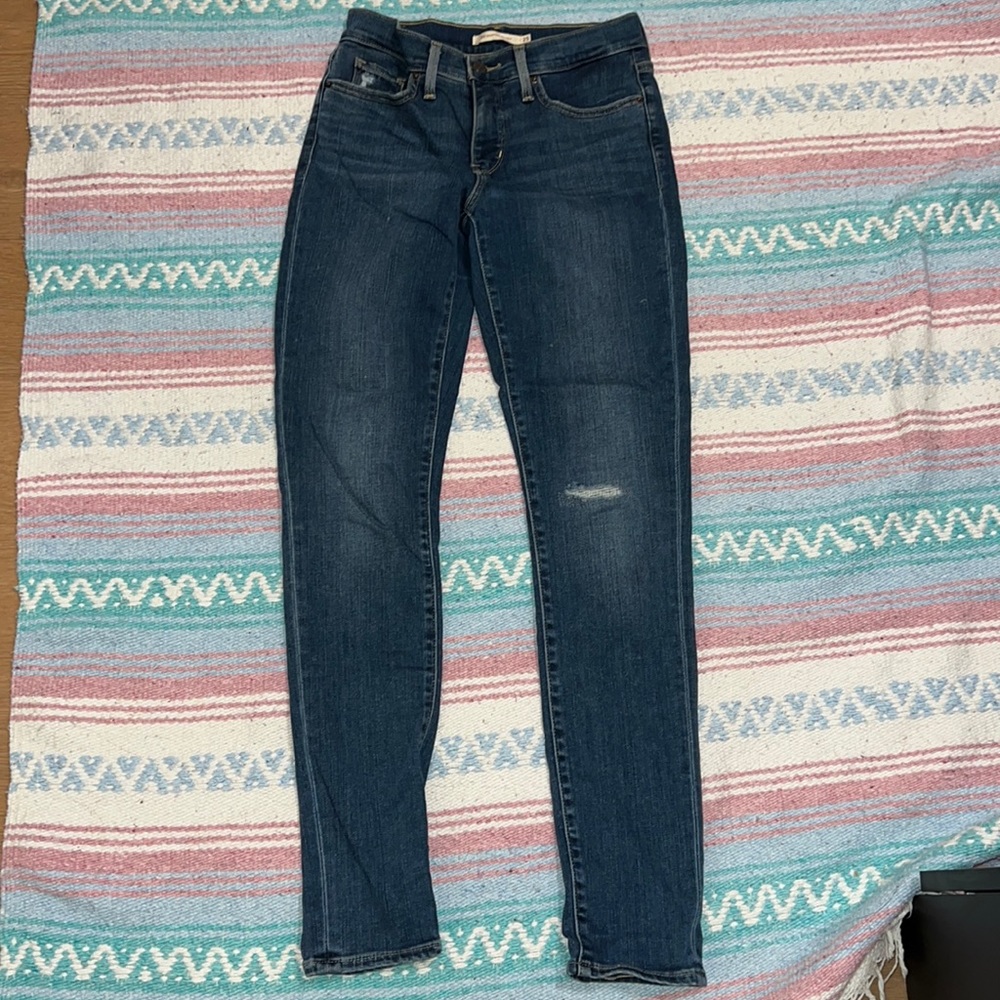 Levi’s 311 Shaping Skinny blue distressed jeans